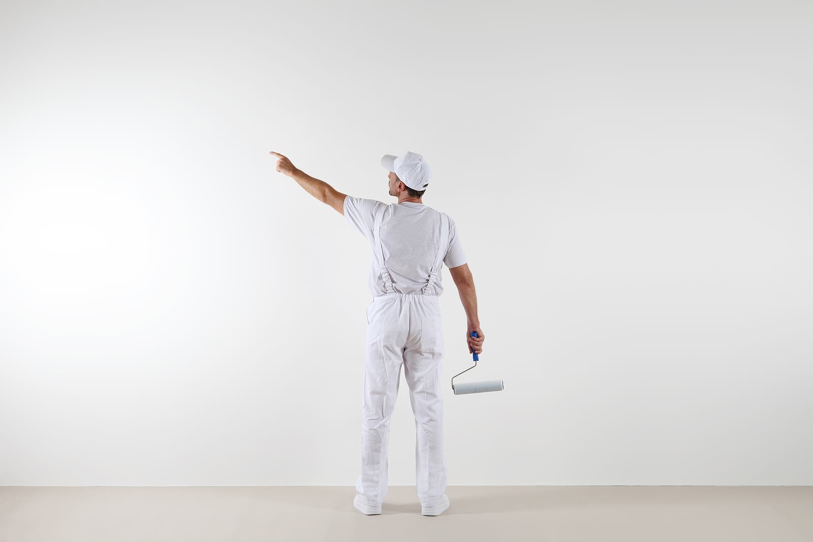 Void property cleaning - painter man pointing with finger